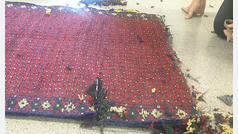 Dos detenidos por llevar nueve kilos de heroína oculta en dos alfombras