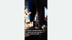 Michael J. Fox falls on stage at Back to the Future Conference