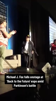 Michael J. Fox falls on stage at Back to the Future Conference