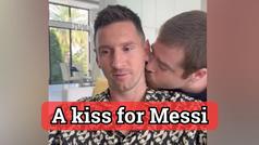 Messi teases social media with a surprise kiss on the neck