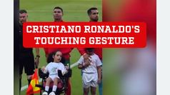Cristiano Ronaldo's touching act: assisting a disabled child onto the pitch
