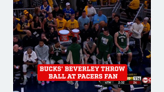 Bucks' Patrick Beverley angrily throws a ball at a Pacers fan