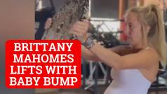 Brittany Mahomes weight lifting form with a very noticeable belly