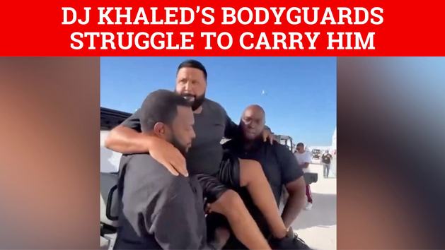 DJ Khaled bodyguards struggle to carry him to the stage after bizarre ...
