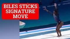 Simone Biles sticks her signature move Biles II at Olympic practice