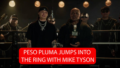 Peso Pluma is joined on stage by Mike Tyson during Billboard performance