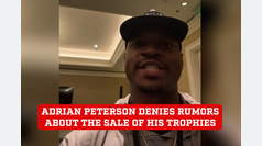 Adrian Peterson, in a serious and forceful manner, denies rumors about the sale of his trophies