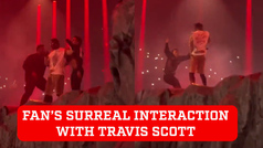 Travis Scott shares crazy moment with fan on stage