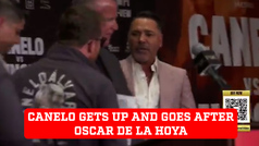 Canelo Alvarez gets up and goes after Oscar De La Hoya during in response to Jaime Munguia fight pre