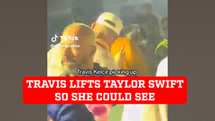 Travis Kelce had to lift Taylor Swift so she could see over the crowds