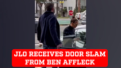 Jennifer Lopez receives a door slam from Ben Affleck while she is getting in the car 