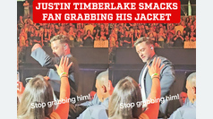Justin Timberlake angrily swats handsy fan grabbing his jacket during concert