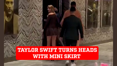 Taylor Swift wears a mini skirt with Travis Kelce causing him to walk faster as she turns heads