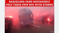 Barcelona fans mistakenly throw stones at their own bus before the match against Paris Saint-Germain