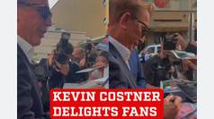 Kevin Costner delights fans with endless autographs during German film tour