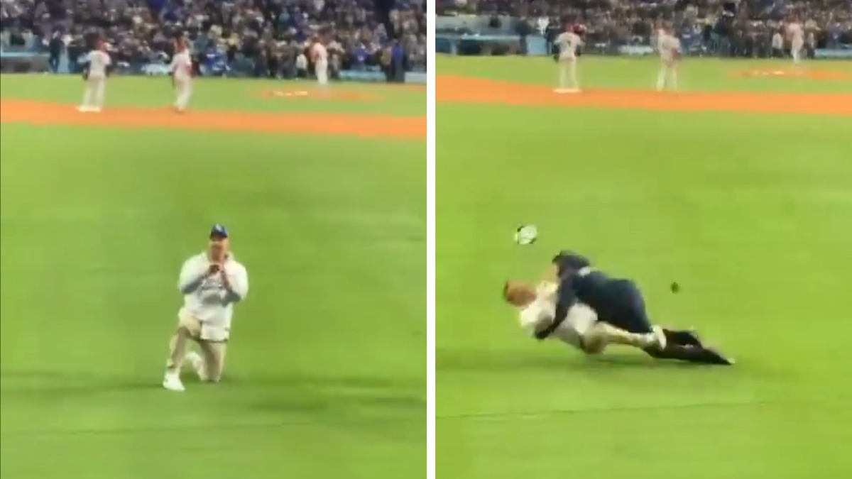 Dodgers' ball girl tackles fan running on field during game