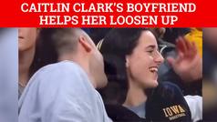 Caitlin Clark's boyfriend Connor McCaffery whispers in her ear to loosen her up
